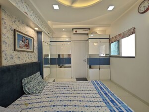 Bedroom in 2 BHK Apartment at Rustomjee Urbania Azziano, Thane West – for Rent