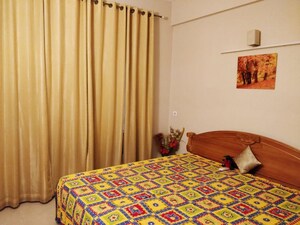 Bedroom in 3.5 BHK Apartment at Gaur Sportswood, Sector 79 – for Rent