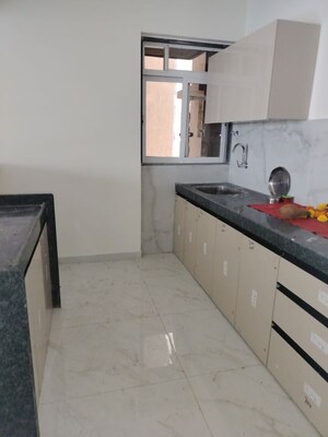 Kitchen in 2 BHK Apartment at Anant Metropolis Insignia Towers, Kasarvadavali – for Rent