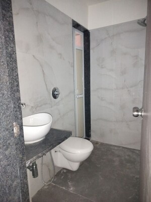 Bathroom in 2 BHK Apartment at Anant Metropolis Insignia Towers, Kasarvadavali – for Rent