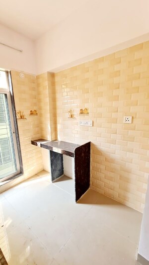 Kitchen in 1.5 BHK Apartment at Sunshine Swapna Nagari, Badlapur West – for Sale