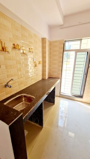 Kitchen in 1.5 BHK Apartment at Sunshine Swapna Nagari, Badlapur West – for Sale