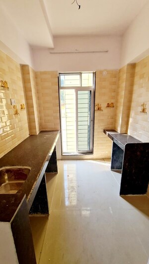 Kitchen in 1.5 BHK Apartment at Sunshine Swapna Nagari, Badlapur West – for Sale