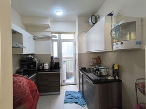 Kitchen in 3 BHK Apartment at Conscient Heritage Max, Sector 102 – for Rent