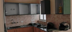 Kitchen in 3 BHK Apartment at Amrapali Dream Valley – for Rent