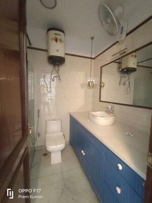 Bathroom in 3 BHK Apartment at Defence Colony – for Rent