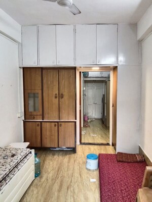 Bedroom in 1 RK Apartment at Mukund Mansion, Dadar West – for Rent