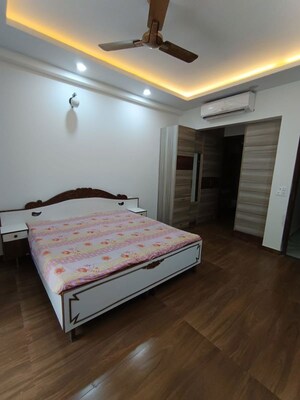 Bedroom in 4 BHK Builder Floor at Sushant Lok I – for Rent