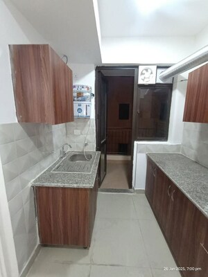 Kitchen in 3 BHK Apartment at RG Luxury Homes, Sector 16b Greater Noida – for Rent