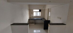 Kitchen in 1 BHK Apartment at Atria Dhanashree Aangan, Undri – for Rent