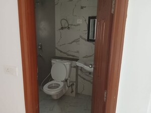 Bathroom in 3 BHK Apartment at Purvanchal Royal City II, Chi V Greater Noida – for Rent