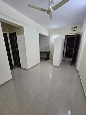 Living Room in 1 BHK Apartment at Naman Sudarshan, Shivajinagar – for Rent