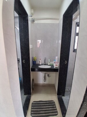 Bathroom in 1 BHK Apartment at Shagun Sunshine Hills 2, Pisoli – for Rent