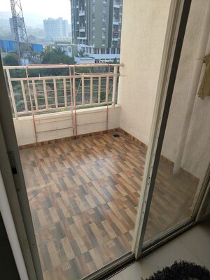 Balcony in 2 BHK Apartment at Majestique Landmark Magnum, Pisoli – for Rent