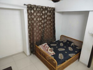 Bedroom in 2 BHK Apartment at Majestique Landmark Magnum, Pisoli – for Rent