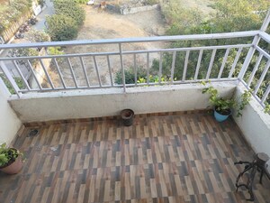 Balcony in 2 BHK Apartment at Majestique Landmark Magnum, Pisoli – for Rent