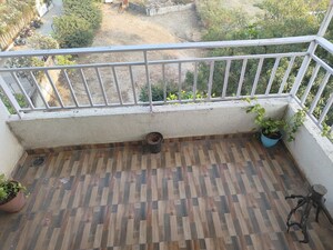 Balcony in 2 BHK Apartment at Majestique Landmark Magnum, Pisoli – for Rent