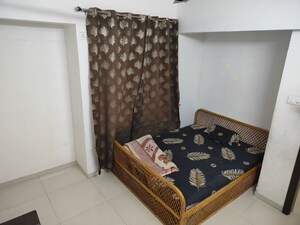 Bedroom in 2 BHK Apartment at Majestique Landmark Magnum, Pisoli – for Rent