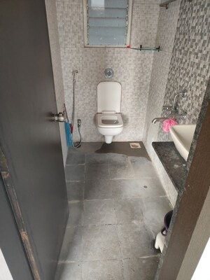 Bathroom in 2 BHK Apartment at Majestique Landmark Magnum, Pisoli – for Rent