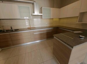 Kitchen in 3 BHK Apartment at ABA Cleo County, Sector 121 – for Rent
