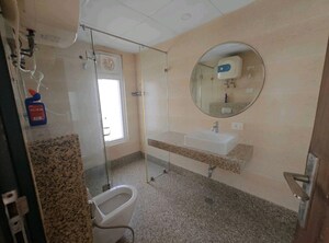 Bathroom in 3 BHK Apartment at ABA Cleo County, Sector 121 – for Rent
