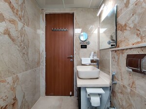 Bathroom in  Apartment at Bhartiya Nikoo Homes Phase 2, Thanisandra Main Road – for Rent