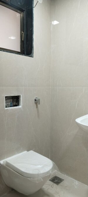 Bathroom in 3 BHK Apartment at The Blue Diamond, Mulund West – for Rent