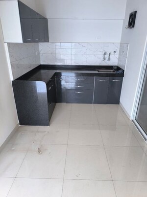 Kitchen in 2 BHK Apartment at Mantra Essence, Undri – for Sale