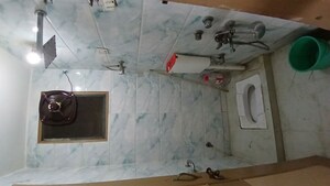 Bathroom in 3 BHK Apartment at Zakir Nagar – for Sale