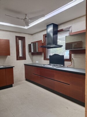 Kitchen in 4 BHK Apartment at Vasant Vihar – for Rent