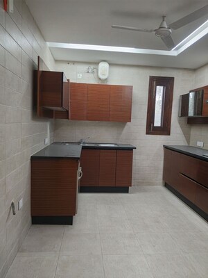 Kitchen in 4 BHK Apartment at Vasant Vihar – for Rent