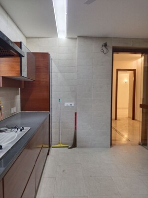 Kitchen in 4 BHK Apartment at Vasant Vihar – for Rent