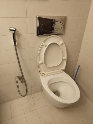 Bathroom in 4 BHK Apartment at Vasant Vihar – for Rent