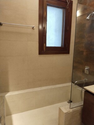 Bathroom in 4 BHK Apartment at Vasant Vihar – for Rent