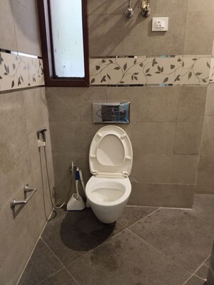 Bathroom in 4 BHK Apartment at Vasant Vihar – for Rent