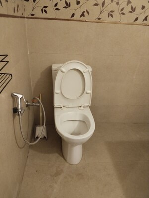 Bathroom in 4 BHK Apartment at Vasant Vihar – for Rent