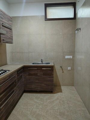 Kitchen in 4 BHK Apartment at Vasant Vihar – for Rent