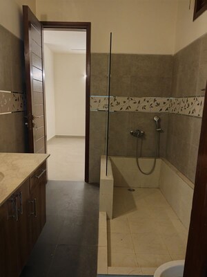 Bathroom in 4 BHK Apartment at Vasant Vihar – for Rent