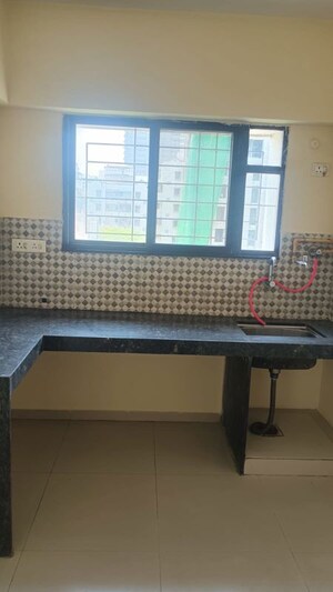 Kitchen in 2 BHK Apartment at Mantra Fifth Avenue, Hadapsar – for Rent