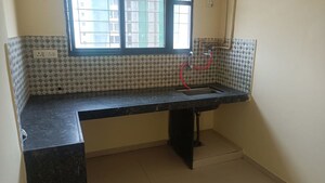 Kitchen in 2 BHK Apartment at Mantra Fifth Avenue, Hadapsar – for Rent
