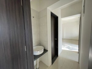 Bathroom in 1.5 BHK Apartment at Sankla Satyam Niranjani, Hadapsar – for Rent