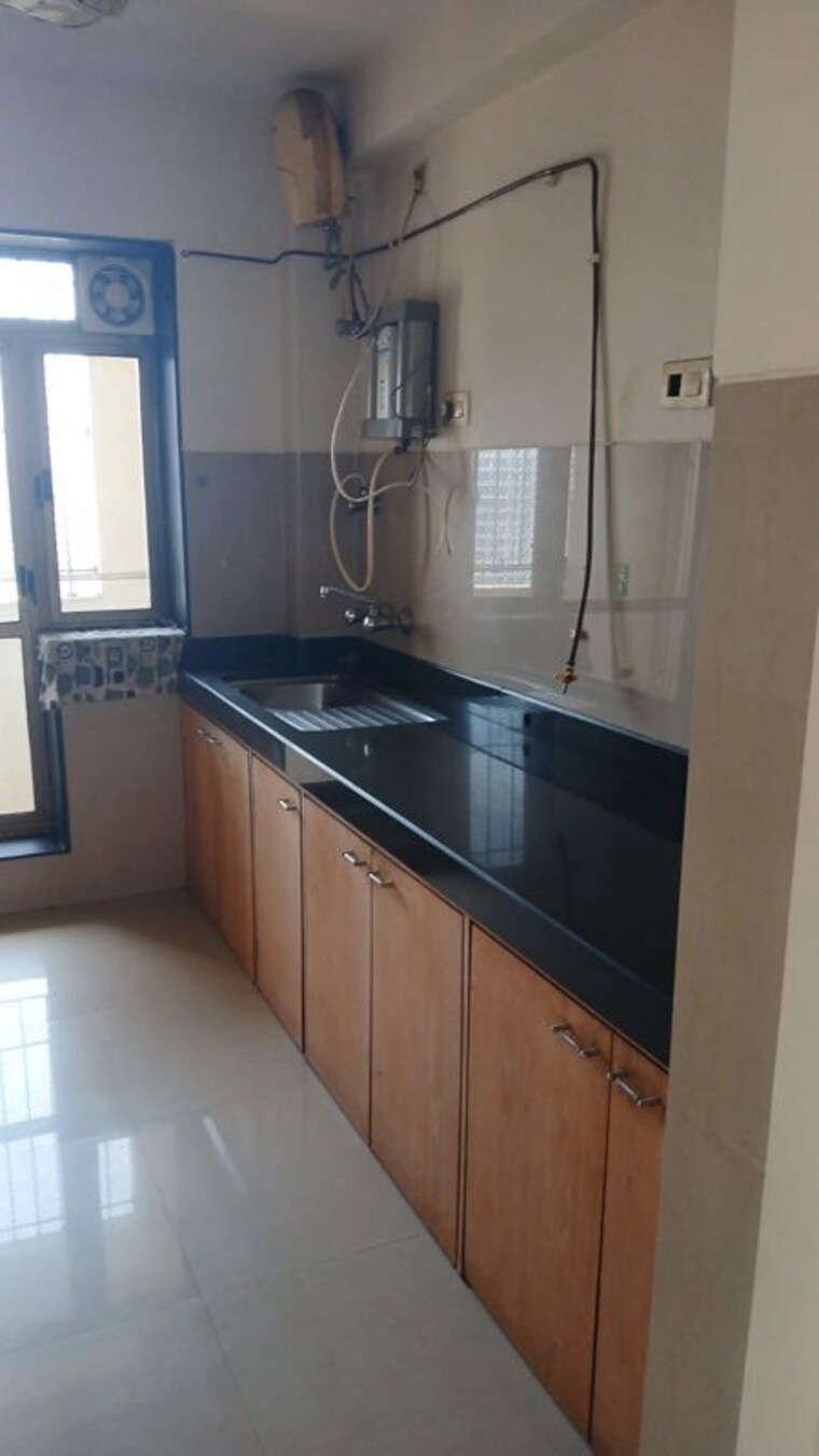 Kitchen, raheja-acropolis 3 Bedroom 900 Sq.Ft. Apartment In Deonar Mumbai 10344721