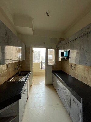 Kitchen in 2.5 BHK Apartment at AWHO Shanti Vihar, Sector 95 – for Sale
