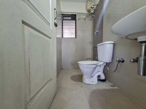 Bathroom in 2 BHK Apartment at Clover Everest World Chs Ltd, Kolshet Road – for Sale