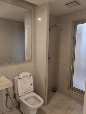 Bathroom in 3 BHK Apartment at Hiranandani Estate Rodas Enclave, Ghodbunder Road – for Rent