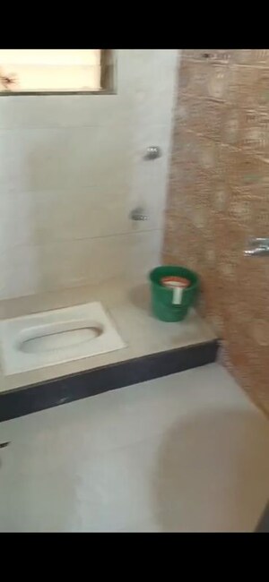 Bathroom in 2 BHK Apartment at MK Shivam Greens, Badlapur West – for Rent