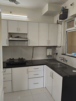 Kitchen in 3 BHK Apartment at Hiranandani Estate, Ghodbunder Road – for Rent