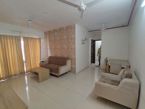 Living Room in 2 BHK Apartment at Metropolis Rivera, Kasarvadavali – for Rent