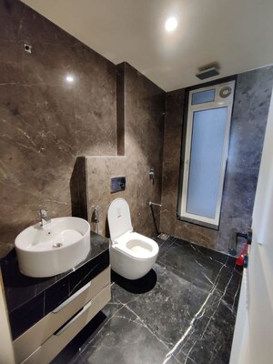 Bathroom in 2 BHK Apartment at Lokhandwala Breeze Apartments, Andheri West – for Rent