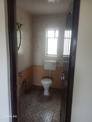 Bathroom in 2 BHK Apartment at Vardhaman Township, Hadapsar – for Rent